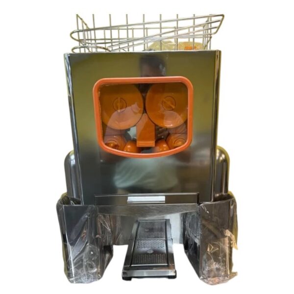 Máquina exprimidora de naranjas a estrenar